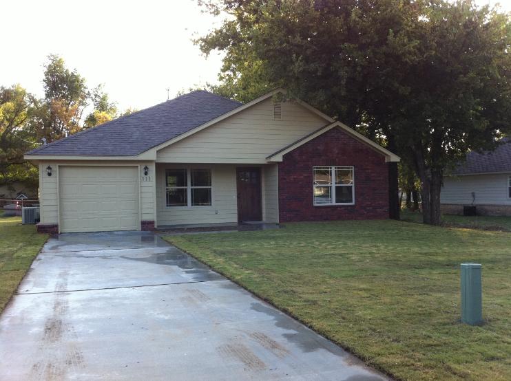 New Home Exterior with beautiful yard