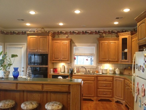 Well Lit Kitchen with Oak Cabinets